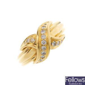 TIFFANY & CO. - an 18ct gold diamond ring.