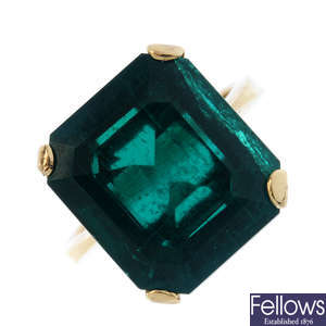 A synthetic emerald ring.