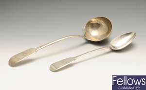 An early Victorian silver soup ladle & a silver basting spoon. (2).