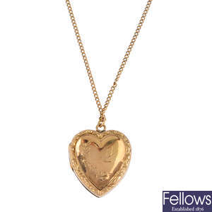 A mid 20th century 9ct gold back and front locket, with chain.