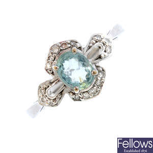 An 18ct gold aquamarine and diamond ring and a selection of loose tourmaline stones.