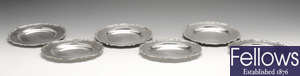 A set of six early twentieth century small silver plates.