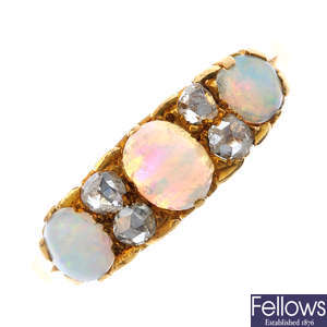 An early 20th century gold opal and diamond dress ring.