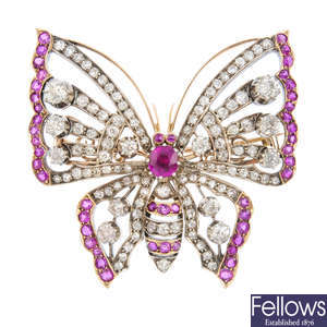 An early 20th century diamond and ruby butterfly brooch.