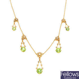 An early 20th century 15ct gold peridot and split pearl necklace.