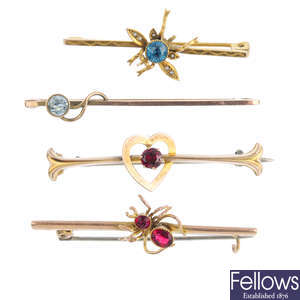 Four early 20th century gold gem-set brooches.