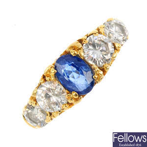A diamond and sapphire five-stone ring.