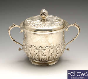 An early 20th century silver twin-handled cup & cover.