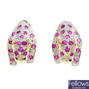 A pair of 9ct gold ruby and diamond leopard earrings.