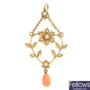 An early 20th century gold coral and pearl pendant.