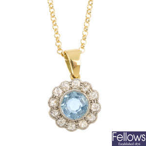 A 14ct gold aquamarine and diamond pendant, with chain.