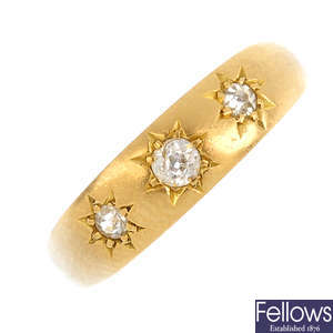 An 18ct gold diamond single-stone ring and a diamond gypsy ring.