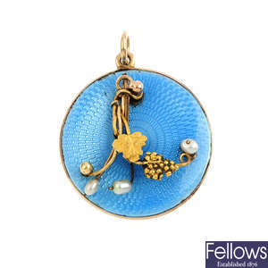 An early 20th century seed pearl and enamel locket.