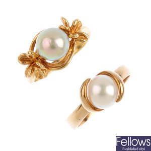Two cultured pearl dress rings.