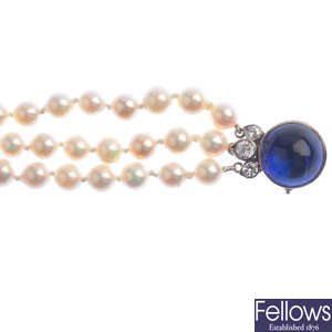 A cultured pearl and gem-set three-row bracelet.