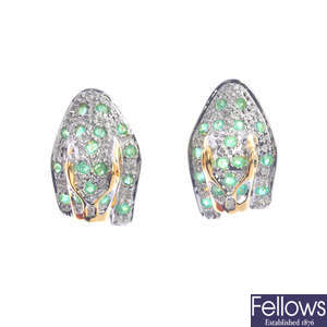 A pair of 18ct gold emerald and diamond leopard earrings.