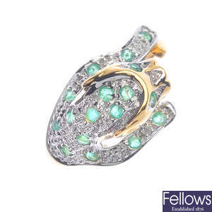 An 18ct gold emerald and diamond leopard ring.