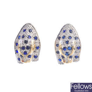 A pair of 9ct gold sapphire and diamond leopard earrings.