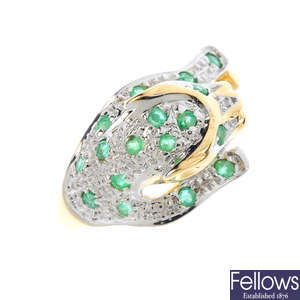 An 18ct gold emerald and diamond leopard ring.