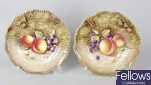 A pair of Royal Worcester porcelain fruit-painted plates