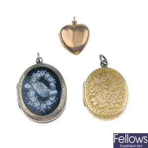 Four lockets and a compact pendant.