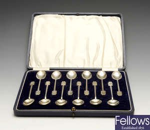A 1930's cased set of twelve silver teaspoons, etc.