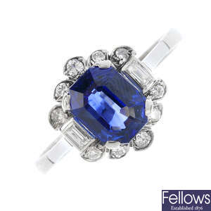 A mid 20th century gold and platinum, sapphire and diamond cluster ring.