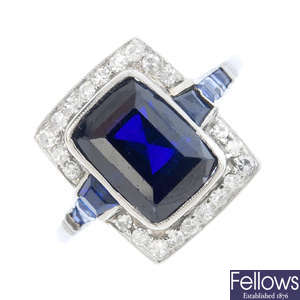 A mid 20th century synthetic sapphire, sapphire and diamond cluster ring.