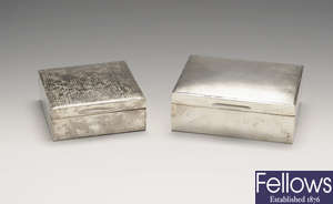 A 1930's silver mounted cigarette box & a 1950's silver mounted cigarette box. (2).
