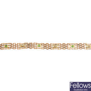 An early 20th century 15ct gold demantoid garnet and split pearl  bracelet.