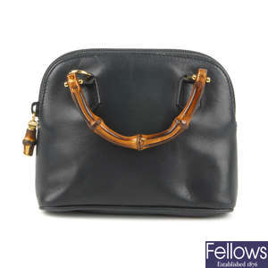 GUCCI - a mini leather bamboo handbag.