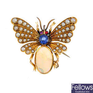 A late Victorian gold, sapphire, split pearl and opal butterfly brooch.