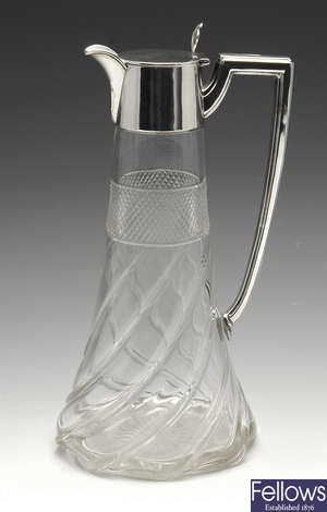 An early 20th century silver mounted glass claret jug by Walker & Hall.