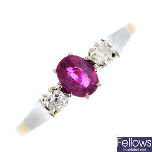 A mid 20th century 18ct gold ruby and diamond three-stone ring.