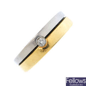 A platinum and 18ct gold diamond band ring.