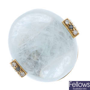 An 18ct gold aquamarine, diamond and gem-set ring.