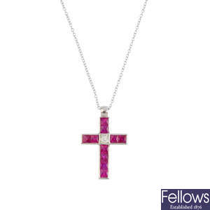 A ruby and diamond cross pendant, with chain.