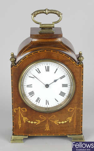 An early to mid 20th century inlaid mantel clock