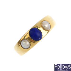 A lapis lazuli and split pearl ring.