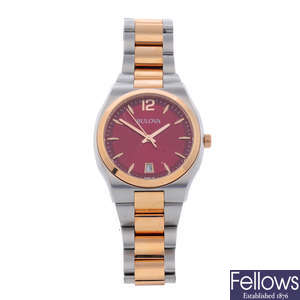 BULOVA - a mid-size bi-colour bracelet watch.