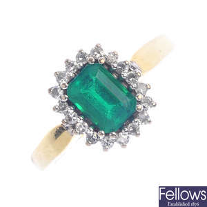 An 18ct gold synthetic emerald and diamond cluster ring.