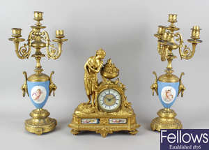 A late 19th century French porcelain-mounted mantel clock