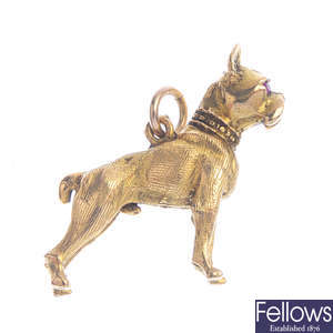 A 9ct gold ruby dog charm.