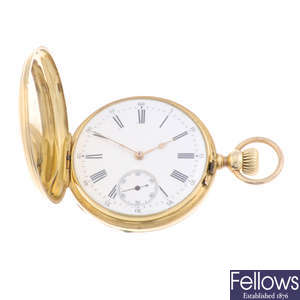 A yellow metal full hunter pocket watch with yellow metal fob watch.