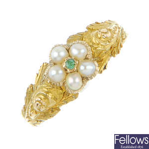 A mid Victorian split pearl and green gem memorial ring.