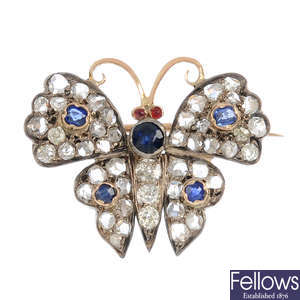 A diamond and sapphire butterfly brooch.