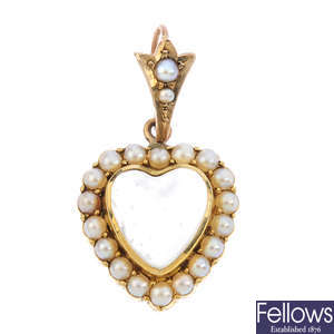 An early 20th century 9ct gold moonstone and split pearl pendant.