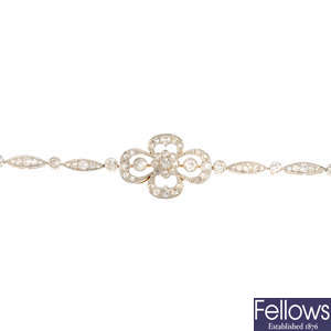 An early 20th century 18ct gold diamond bracelet. with fitted case