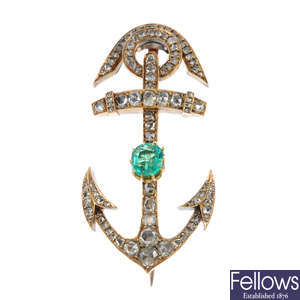 A late 19th century emerald and diamond anchor brooch.