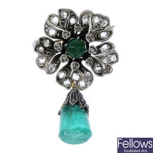 An early 20th century emerald and diamond brooch.